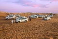 Dubai, UAE: Jeeps and tourists in sand desert