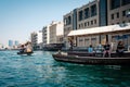 DUBAI, UAE - MARCH 7: Boats Abra ferries cruise business on the Bay Creek