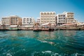 DUBAI, UAE - MARCH 7: Boats Abra ferries cruise business on the Bay Creek