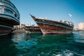 DUBAI, UAE - MARCH 7: Boats Abra ferries cruise business on the Bay Creek