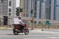 DUBAI, UAE - MAY 12, 2016: motorcycle food delivery service