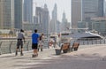 DUBAI, UAE - MAY 12, 2016: roller skaters on pedestrian walkway