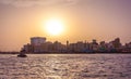 DUBAI, UAE-MAY17: Traditional Abra ferries along Dubai Creek. The Creek divides the city into two main sections: Deira and Bur