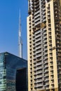 Dubai, UAE - 09.29.2022 - Modern buildings in Business Bay district. Opus tower, Burj Khalifa. City Royalty Free Stock Photo