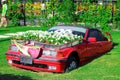 DUBAI, UAE - NOV, 2013: Fun cartoon car made with flowers at the Miracle Garden in Dubai. United Arab Emirates