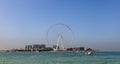 Dubai, UAE, November 2021, Panoramic view from JBR Beach over water towards Bluewaters Island with the Ain Dubai, the tallest and Royalty Free Stock Photo