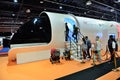 The Virgin Hyperloop One prototype and people are in queue for testing of carriage interior on Dubai Motor Show 2019