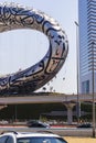 Dubai, UAE - 03.15.2021 Rope access workers working at heights, cleaning museum of the future building. Architecture Royalty Free Stock Photo