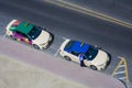 Two taxi cars waiting for passengers in the street. Dubai city