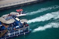 Dubai, UAE 2020: Tourist enjoying ride in luxury motor boats in marina area Royalty Free Stock Photo