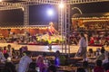 Dubai, UAE - 11.06.2022 - Traditional dancer performs in the front of the crowd during desert safari. Safari