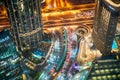 Dubai, UAE, United Arab Emirates - May 25, 2021: Aerial View Of Urban Background Of Illuminated Cityscape With Towers In Royalty Free Stock Photo