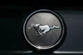 Dubai, UAE, United Arab Emirates - May 25, 2021: Close Up Of Logo Logotype Sign Of Ford Mustang on hood. Ford Mustang is Royalty Free Stock Photo