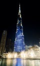 Amazing fountain show in front of the Burj Khalifa skyscraper at night in Dubai. Fountains in front of the Burj Khalifa