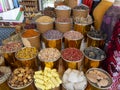 Dubai, UAE. View of the old Bur Dubai spices souk market in Creek district. Colorful stores with different spices Royalty Free Stock Photo