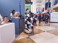 Dubai, UAE - 10.14.2022 - Visitors, robots and participants of GITEX exhibition. Event