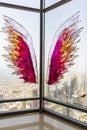 Dubai, UAE - 07.18.2021 - Wings application on the glass at the highest observation deck in world. 125th floor of Burj Khalifa. Royalty Free Stock Photo