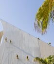 Dubai, UAE - 10.17.2021 Workers cleaning facade of Dubai Creek Golf club with water jet pressure method. industrial