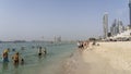 Dubai, United Arab Emirates. Amazing view of the beach and seaside at Dubai Marina. In the background the skyscrapers