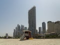 Dubai, United Arab Emirates. Amazing view of the beach and seaside at Dubai Marina. In the background the skyscrapers