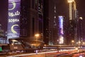 Dubai, United Arab Emirates; Emirates Towers metro station at night; night time traffic; motion blur, long exposure