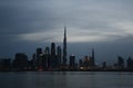 Burj Khalifa and Dubai Skyline under Cloudy Sky, Dubai Downtown Residential and Business Skyscrapers, a view from Dubai Canal