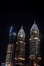 Dubai business central towers at night Royalty Free Stock Photo