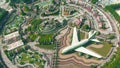 DUBAI, UNITED ARAB EMIRATES - DECEMBER 31, 2019. Aerial down view of the Dubai Miracle Garden with Airbus A380 airliner