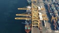 DUBAI, UNITED ARAB EMIRATES - DECEMBER 29, 2019. Aerial view of Jebel Ali port berth and docked cargo ships