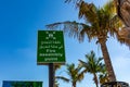 Dubai, United Arab Emirates - December 12, 2018: Fire Assembly Point Sign in Arabic and English