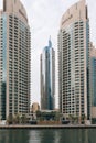 Dubai, United Arab Emirates - December, 2019: Luxury Dubai Marina canal and promenade in beautiful summer day Royalty Free Stock Photo