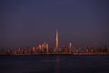 Dubai, United Arab Emirates - December 25, 2019 : A panoramic view of Dubai downtown skyline from Dubai creek harbour side