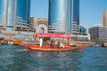 Dubai, United Arab Emirates - February 14, 2023: Traditional wooden tourist boats, abra water taxis and modern sailboats Royalty Free Stock Photo