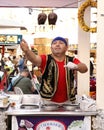 Dubai, United Arab Emirates - February 5, 2023 Turkish ice cream seller in a stall in global village dubai
