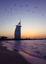 Dubai, United Arab Emirates - January 24, 2018 - Burj Al Arab hotel on Jumeirah beach in Dubai, luxury beach resort in the evening Royalty Free Stock Photo