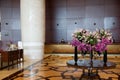 DUBAI, UNITED ARAB EMIRATES - JUN 16, 2019: Modern and bright interior with marble decoration in a spacious lobby of a Royalty Free Stock Photo