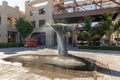 The decorative whale tail fountain on the Pointe - seaside promenade of the Palm Jumeirah island in Dubai city, United Arab