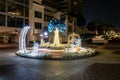 Night view to decorative small square with illuminated Muslim symbols at Dubai Marina in Dubai city, United Arab Emirates Royalty Free Stock Photo