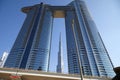 Address Sky View luxury hotel and Burj Khalifa in a sunny day, clear blue sky in Dubai