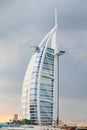 Burj Al Arab luxury hotel in a cloudy sunset in Dubai Royalty Free Stock Photo