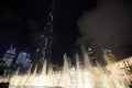 Burj Khalifa skyscraper and Fountain Show illuminated at night in Dubai Royalty Free Stock Photo