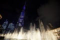 Burj Khalifa skyscraper illuminated at night and Fountain Show in Dubai Royalty Free Stock Photo