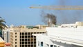 DUBAI, UNITED ARAB EMIRATES, UAE - NOVEMBER 20, 2017: Fire accident occured in Dubai building in front of Hotel Jumeirah
