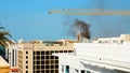 DUBAI, UNITED ARAB EMIRATES, UAE - NOVEMBER 20, 2017: Fire accident occured in Dubai building in front of Hotel Jumeirah