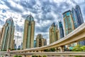 Dubai United Arab Emirates. View from a moving taxi driving in the streets of the city center, the hyper modern roads, the cloud c Royalty Free Stock Photo