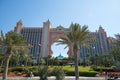 DUBAI, UNITED ARAtlantis The Palm luxury hotel with garden, people and tourists in a sunny day in Dubai Royalty Free Stock Photo