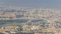 Dubai water canal with pedestrian bridge over it aerial timelapse. Royalty Free Stock Photo