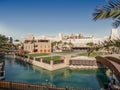 Dubai. Waterway with old wooden bridge in the Souk Madinat Junction mall