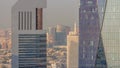 Dubai World Trade Centre on the Sheikh Zayed Road behind office towers in financial district aerial timelapse from above Royalty Free Stock Photo