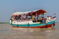 DUBLAR CHAR, BANGLADESH - NOVEMBER 14, 2016: Hindu pilgrims on their boat after Rash Mela festival at Dublar Char Dubla island ,